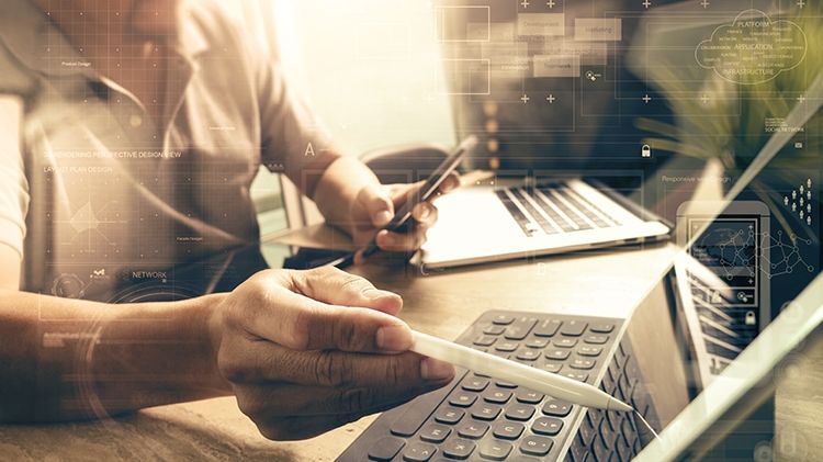 Outsourced Finance Function, Accountant checking numbers.