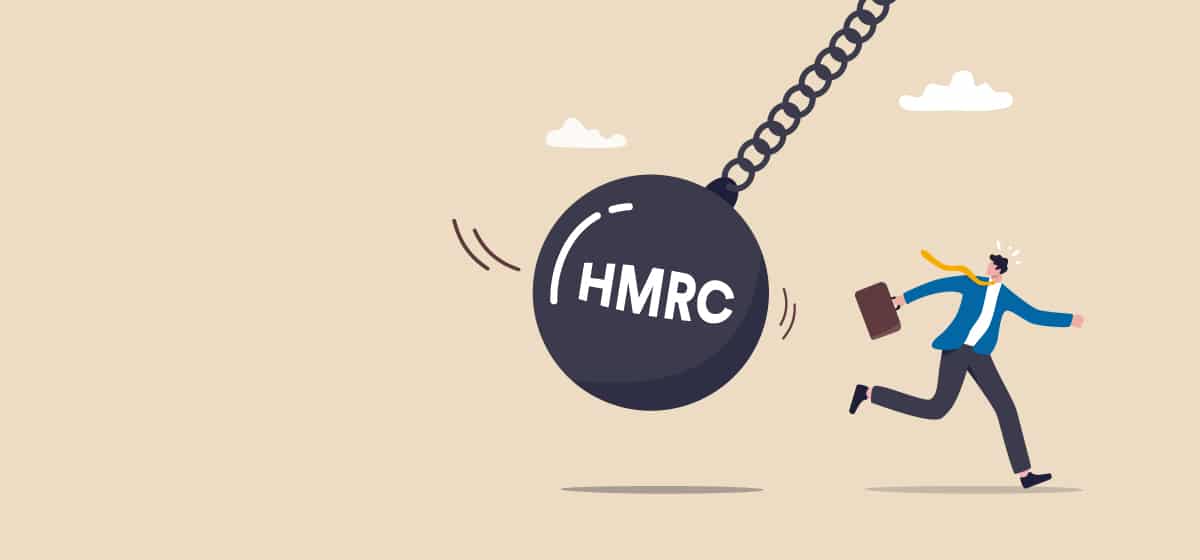 HMRC branded wrecking ball depicted chasing a business person