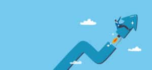 Picture of a graph with a business person breaking away on a rocket